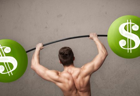 Shartru Wealth image of muscular man lifting barbell with green dollar signs on weights.