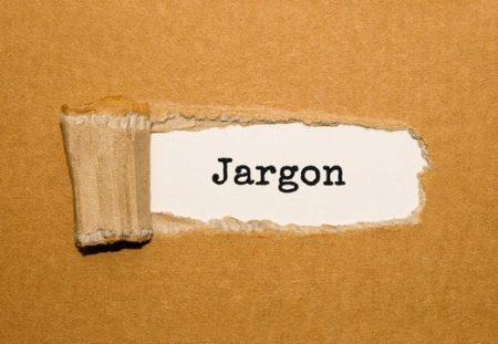 Shartru Wealth Management jargon buster concept with torn paper revealing the word jargon