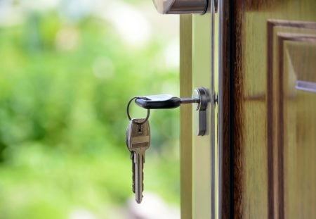 House keys in a door lock symbolising Australian residential property with Shartru Wealth.